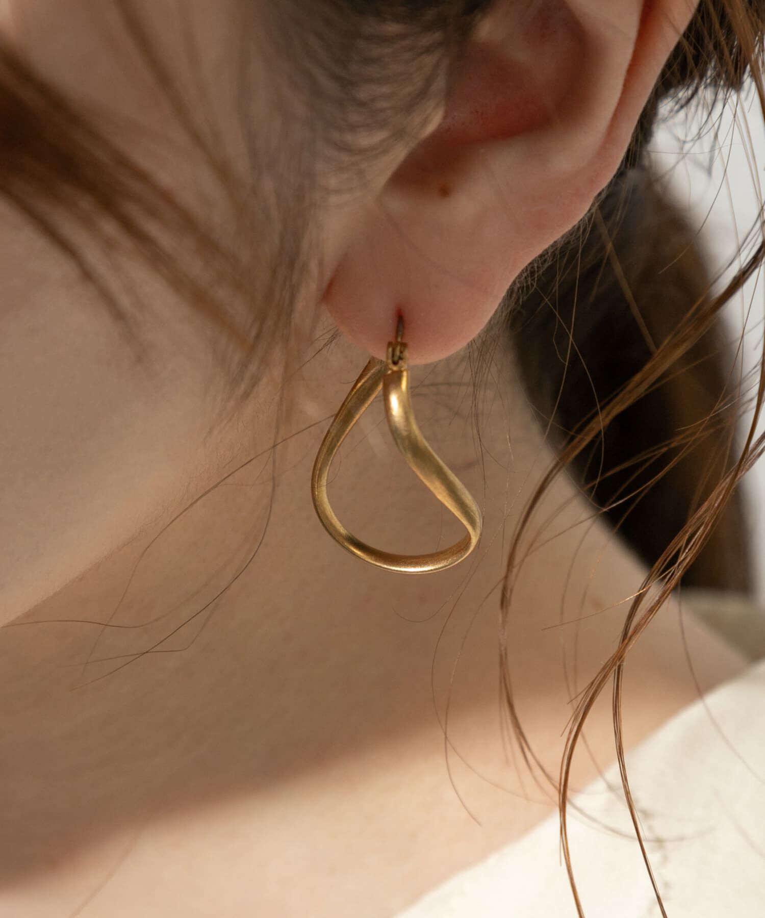 SMELLY「ネジリフープピアス」|ピアス|