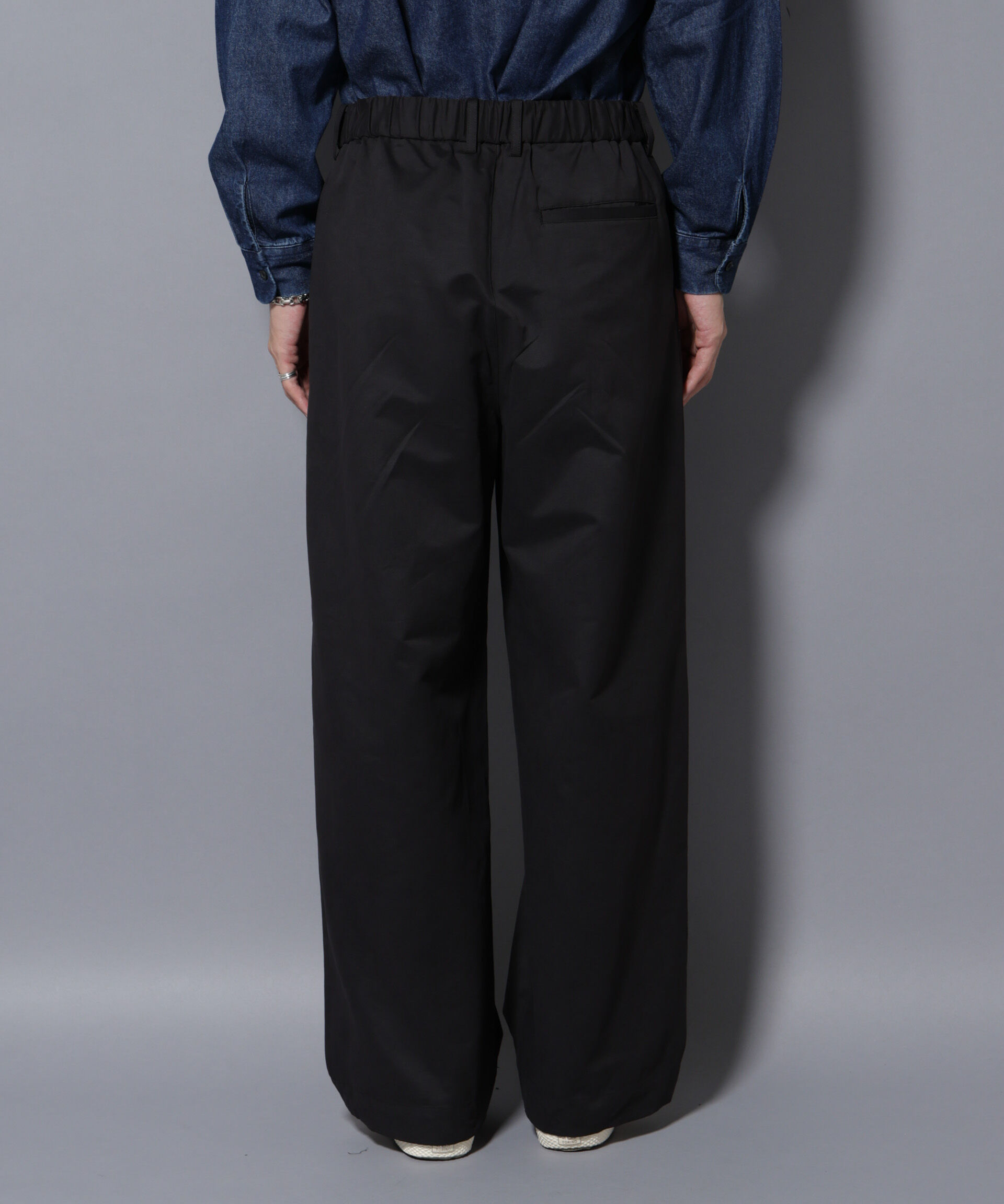 nano･universe「オイルドライクバギーパンツ」|チノ|