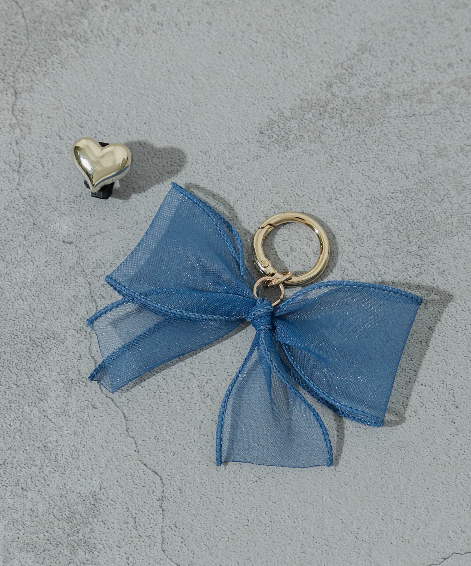 SMELLY「リボンハートアシメスニーカーチャーム」|シューケア|