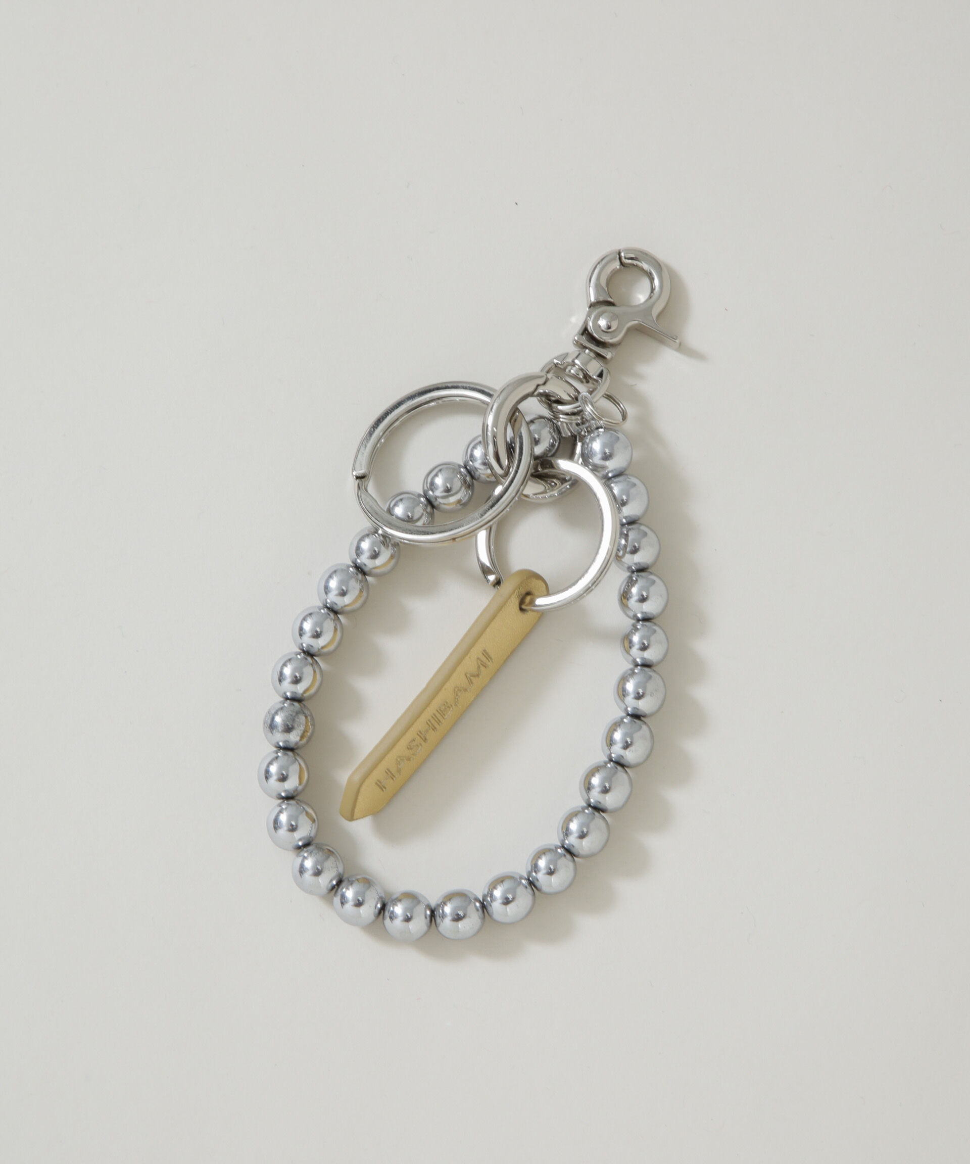 nano･universe「HASHIBAMI/ヘマタイト 丸玉 スマホハンドストラップ」|その他|シルバー