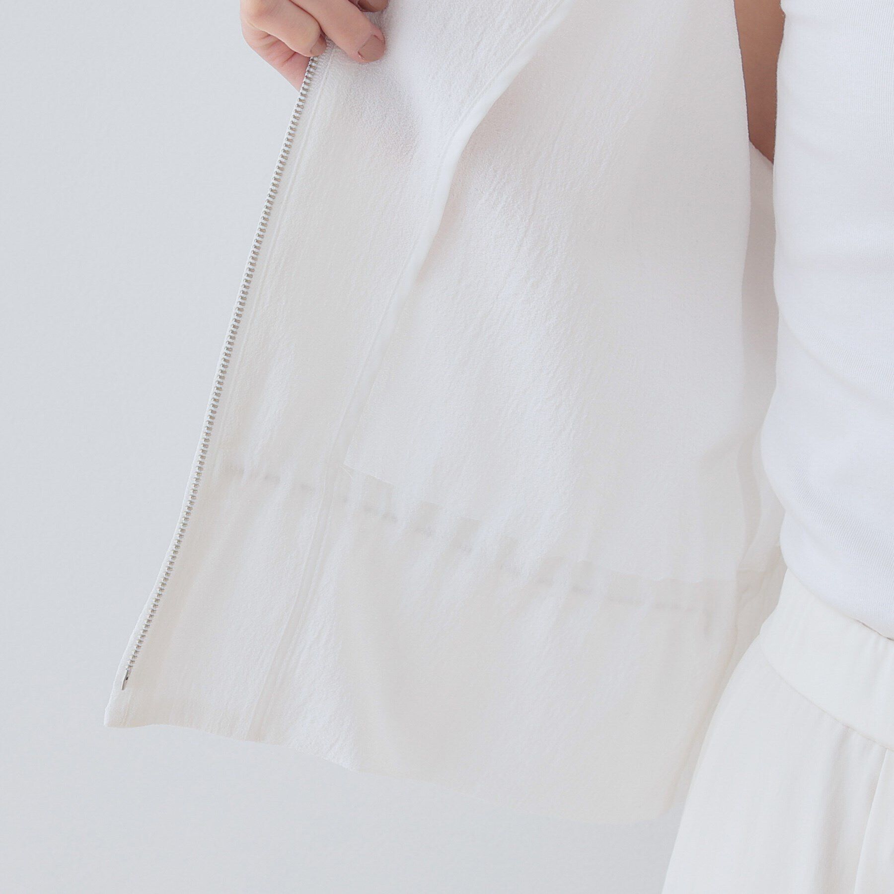 INDIVI「【洗える／凹凸素材】ドロストデザインショート丈ブルゾン」|ブルゾン・スタジャン|