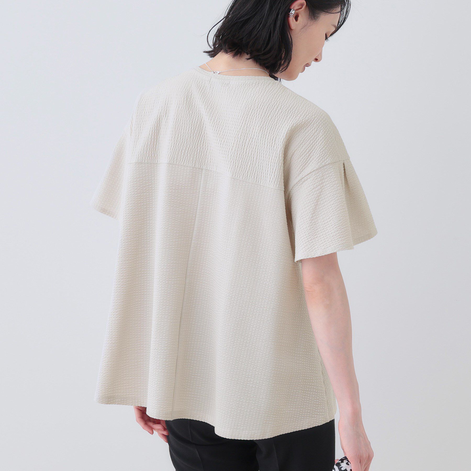 INDIVI「【洗える／体型カバー】凹凸素材フレアデザイントップス」|Tシャツ・カットソー|