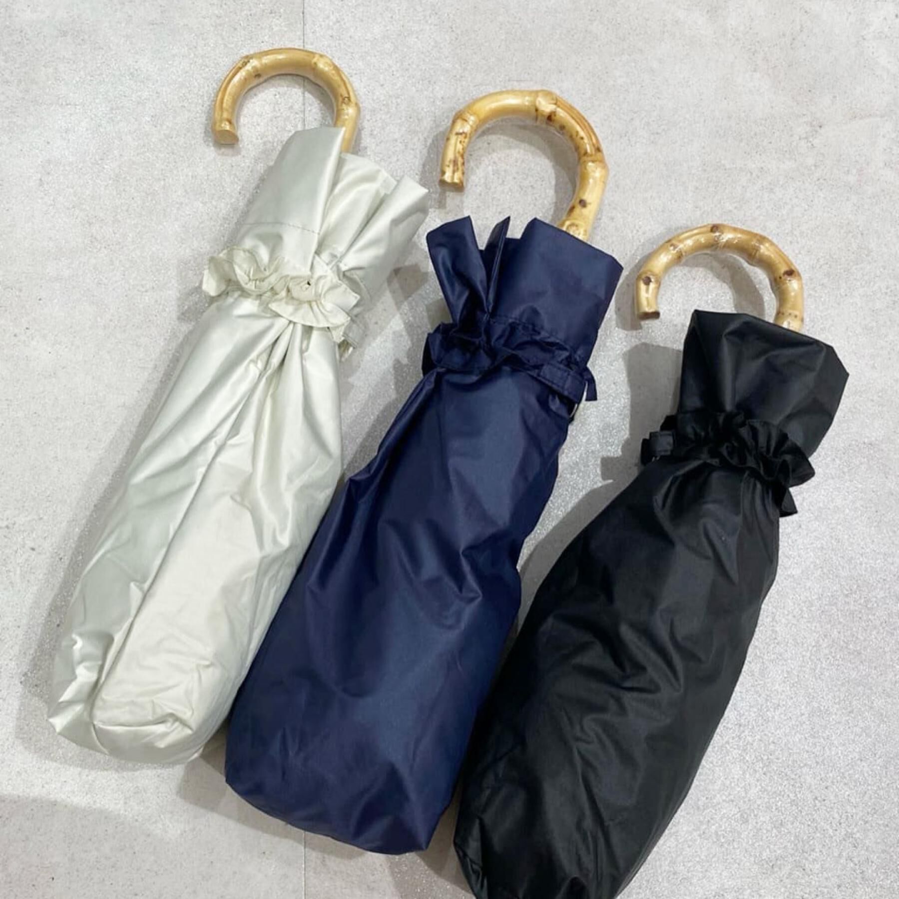 Ober Tashe「pink trick/ピンクトリック　遮光率100％！2段折傘フリル折りたたみ日傘（晴雨兼用）」|傘|