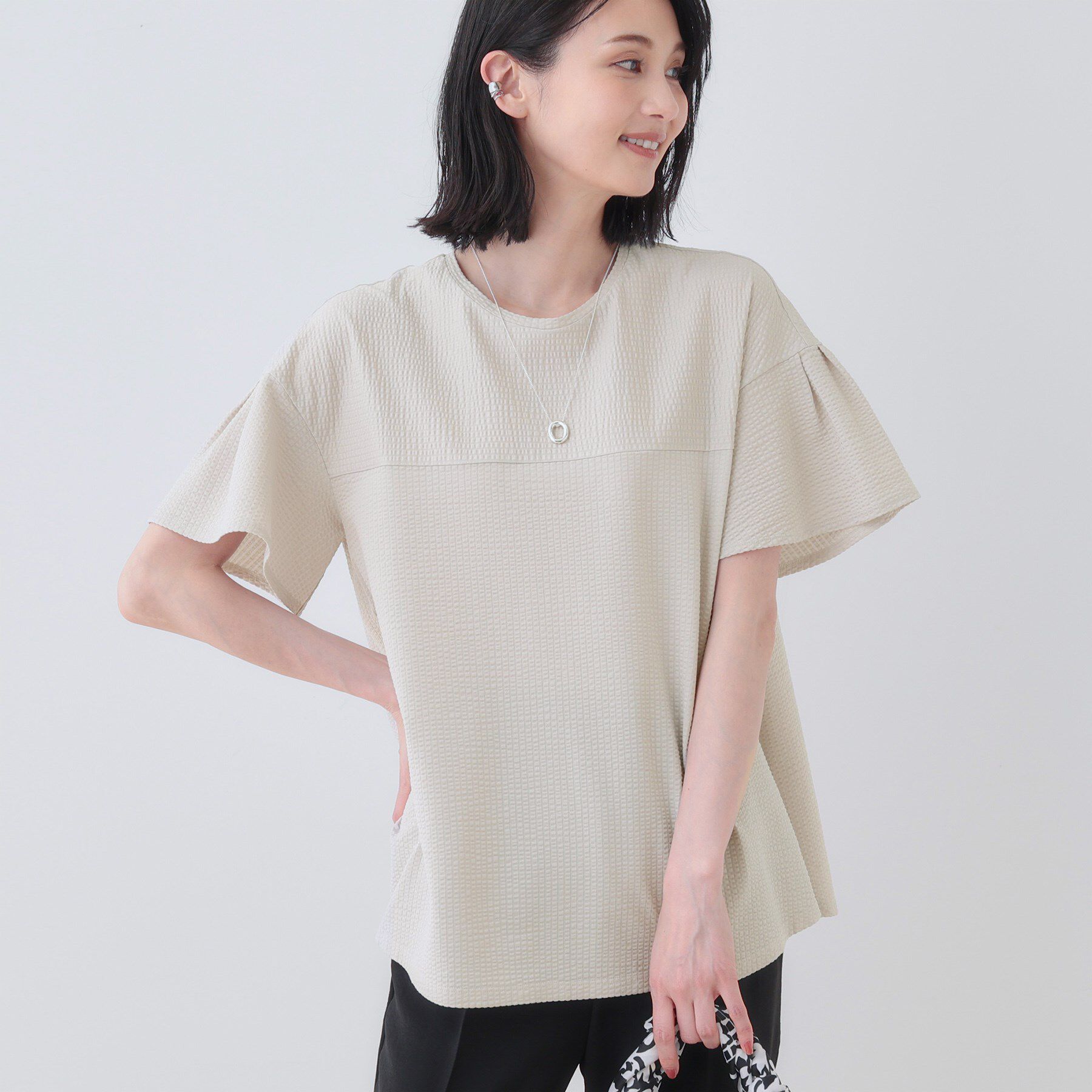 INDIVI「【洗える／体型カバー】凹凸素材フレアデザイントップス」|Tシャツ・カットソー|