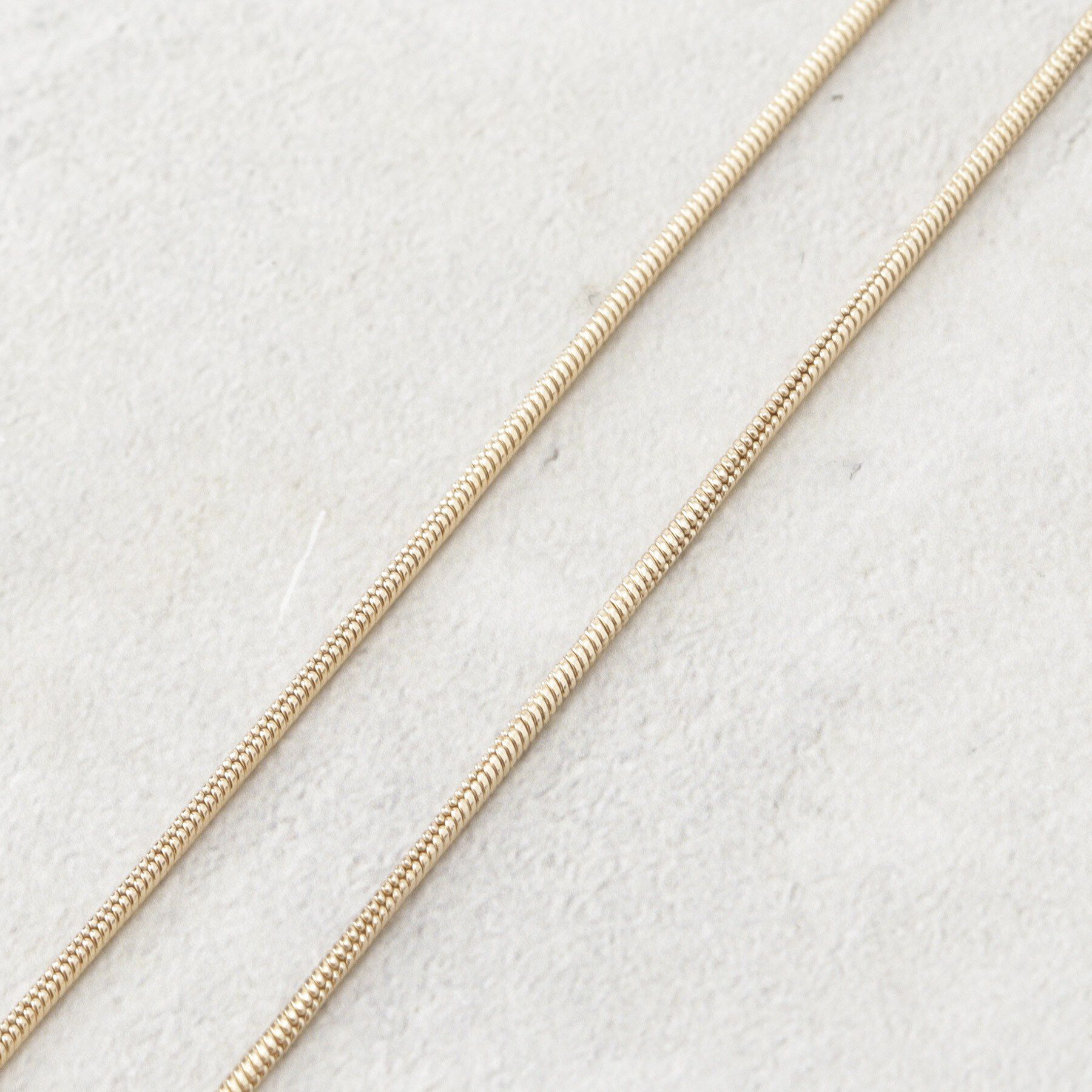 OPAQUE.CLIP「ニュアンスリボン スライドネックレス」|ネックレス|