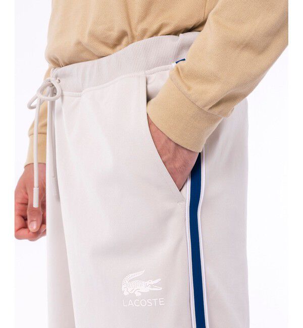 LACOSTE「サイドラインスウェットトラックパンツ」|チノ|