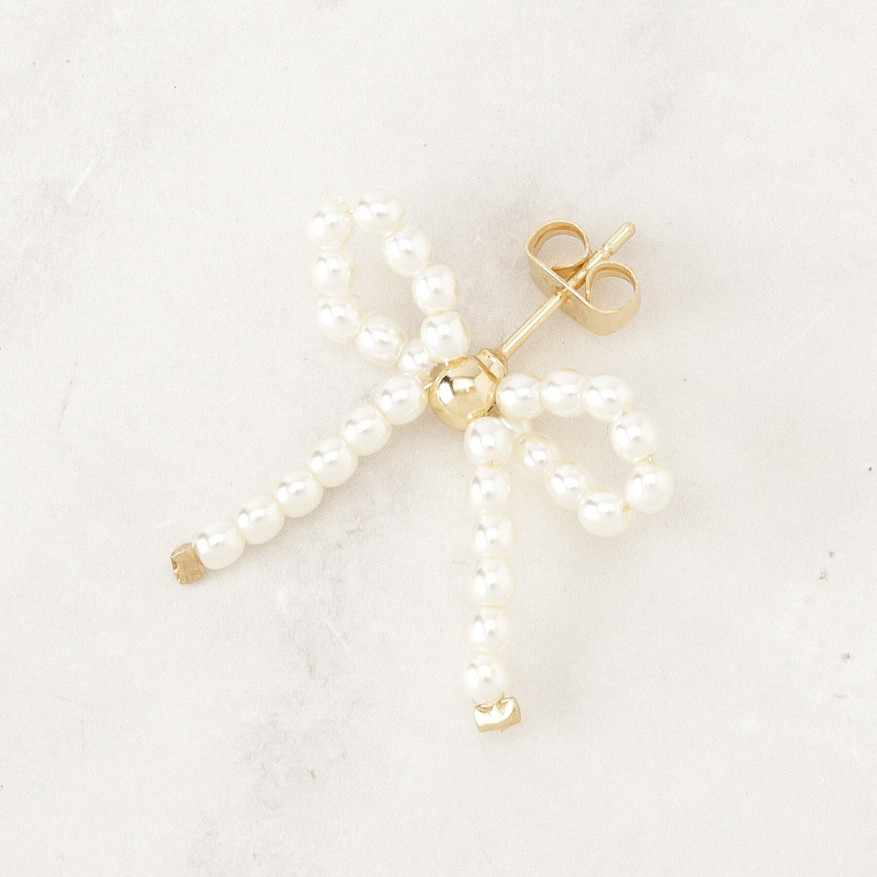 Couture broach「パール調リボンデザインピアス」|ピアス|