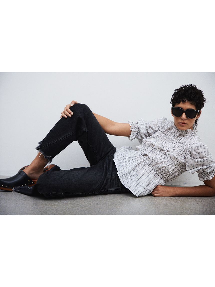 Mila Owen「裾フリンジクロップドフレアデニムパンツ」|デニム|