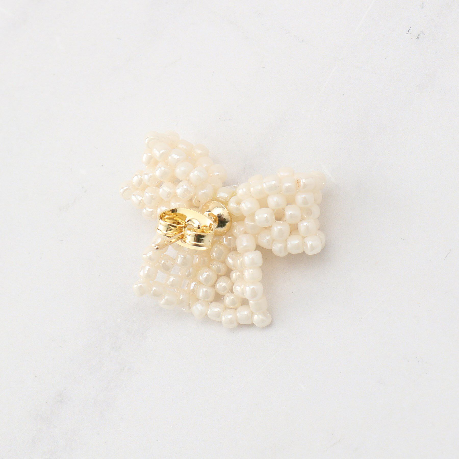 Couture broach「パール調リボンモチーフピアス」|ピアス|
