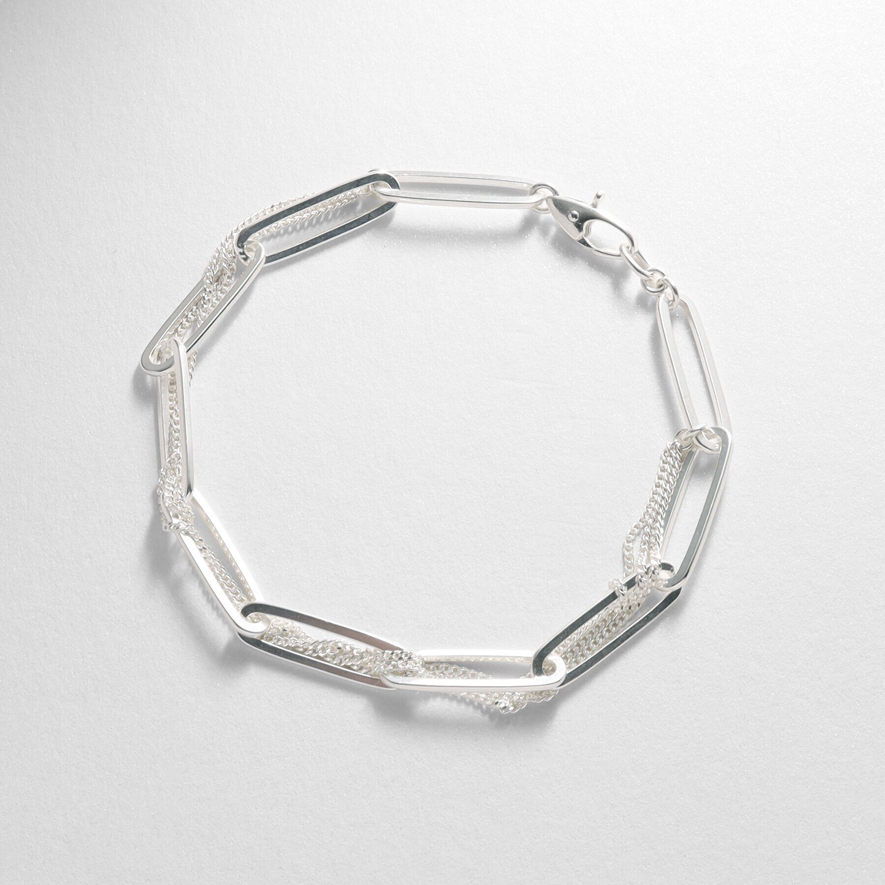 COCOSHNIK ONKITSCH「シルバー ミックスチェーン フラットカーブ スルー ブレスレット」|ブレスレット・バングル|