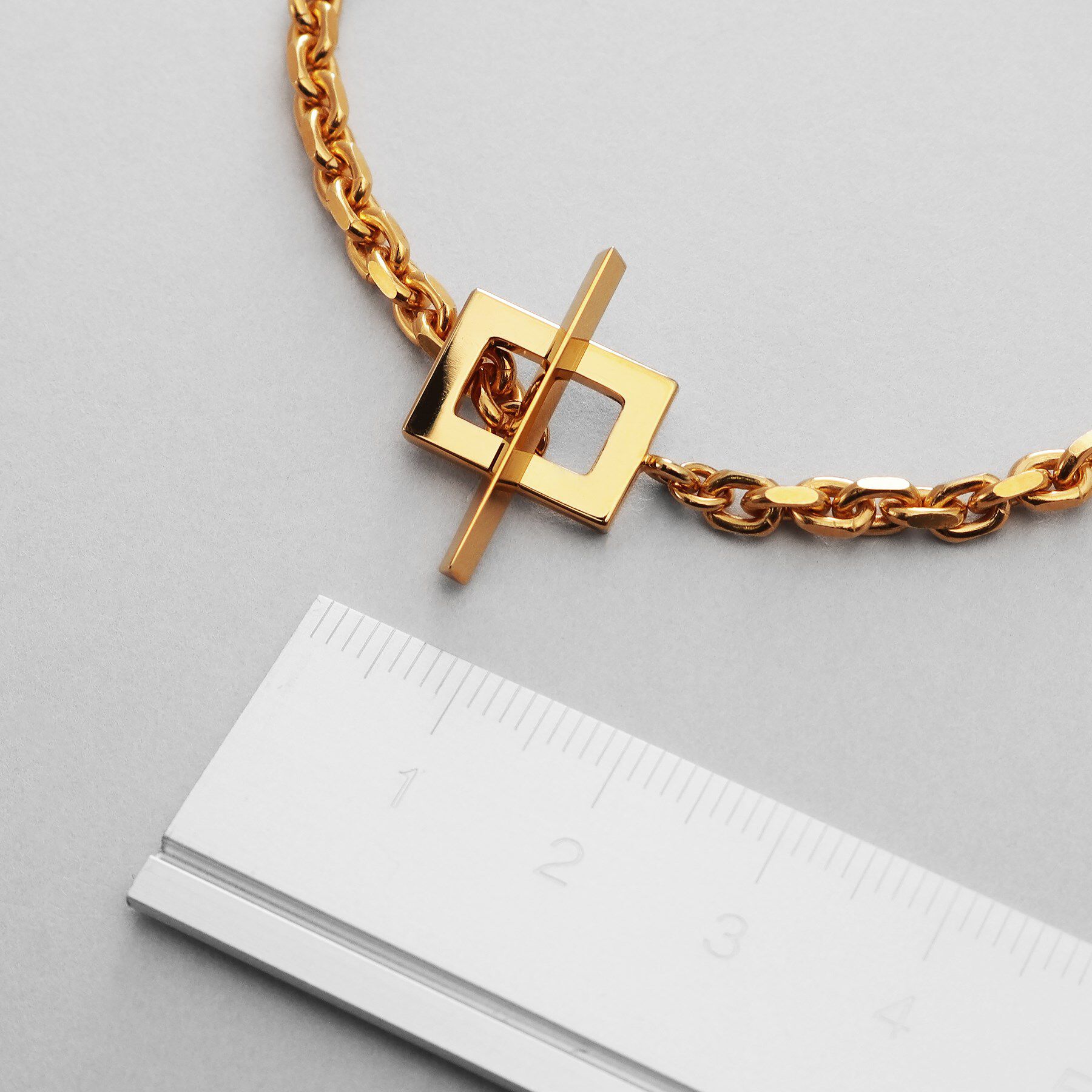 COCOSHNIK ONKITSCH「シルバー カットケーブルチェーン レクタングルマンテルブレスレット L GP」|ブレスレット・バングル|