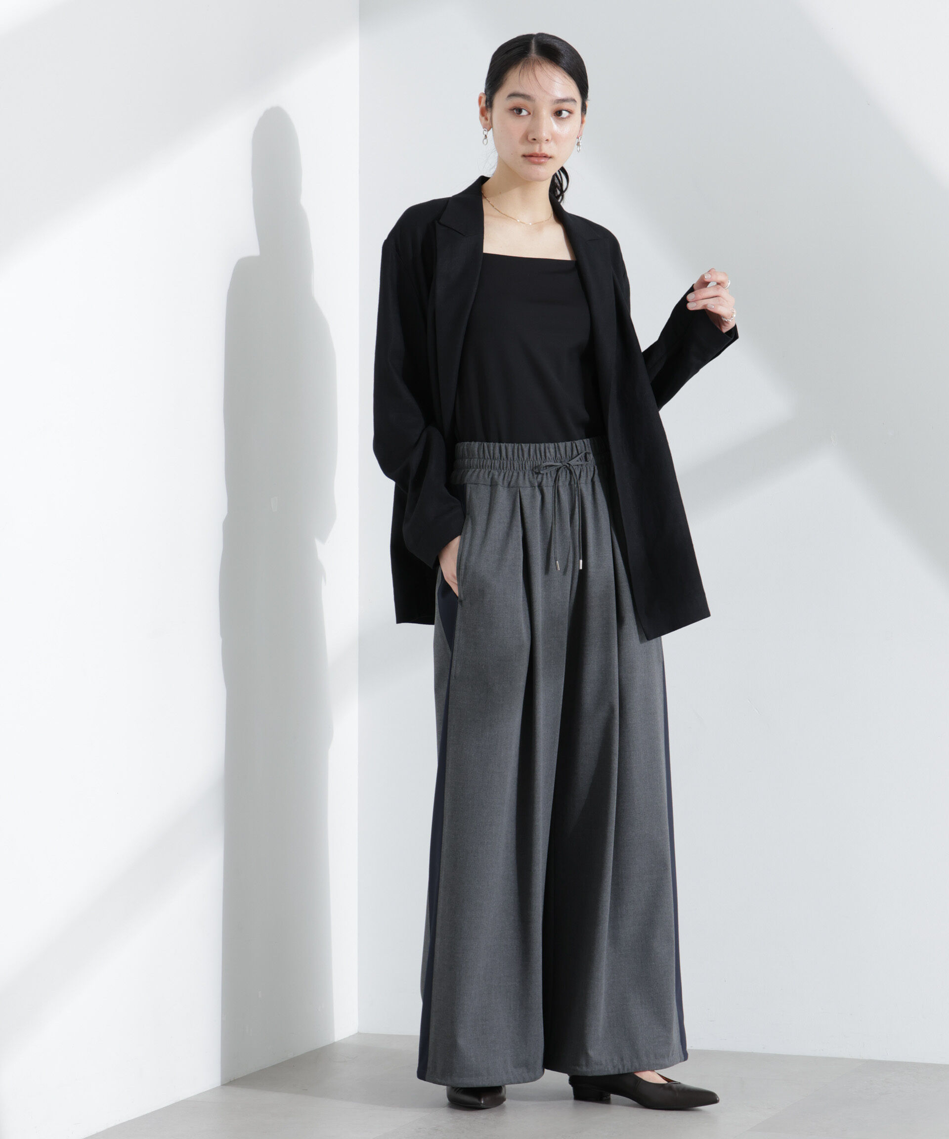 nano･universe「ラインイージーワイドパンツ」|チノ|