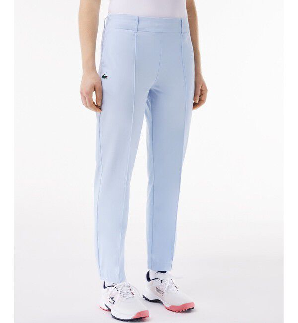 LACOSTE「UPF30+ UVカット センタークリース ストレッチテーパードスリムパンツ / ゴルフパンツ」|チノ|ライトブルー