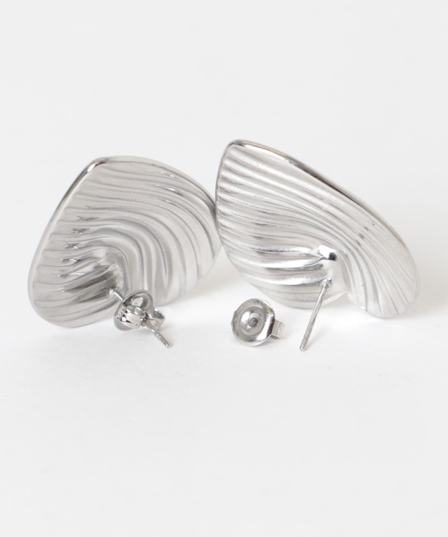 SMELLY「ステンレスウェーブラインハートピアス」|ピアス|