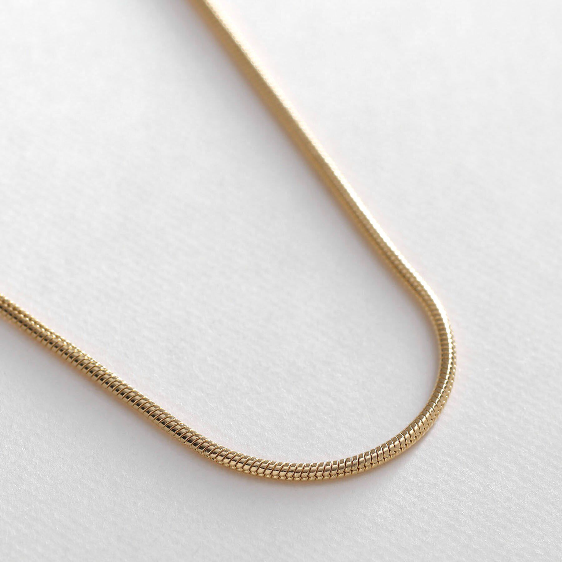 COCOSHNIK ONKITSCH「シルバー デザインチェーン スネークネックレス GP」|ネックレス|