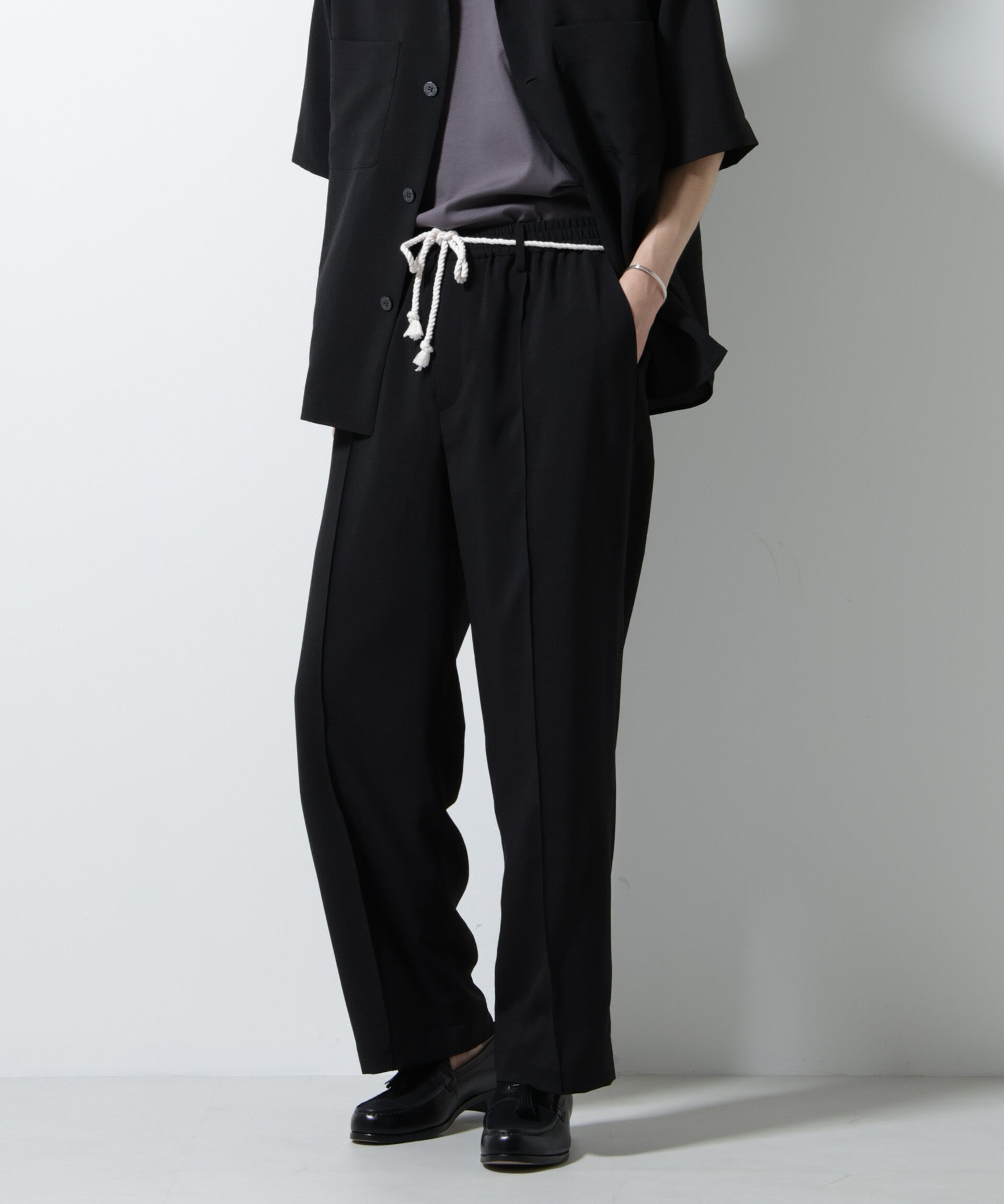 nano･universe「メランジドライイージーテーパードパンツ（セットアップ可）」|チノ|ブラック