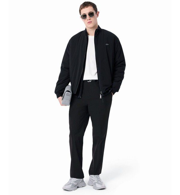 LACOSTE「撥水 テクニカルストレッチ ルーズフィットストレートスラックスパンツ」|スラックス|