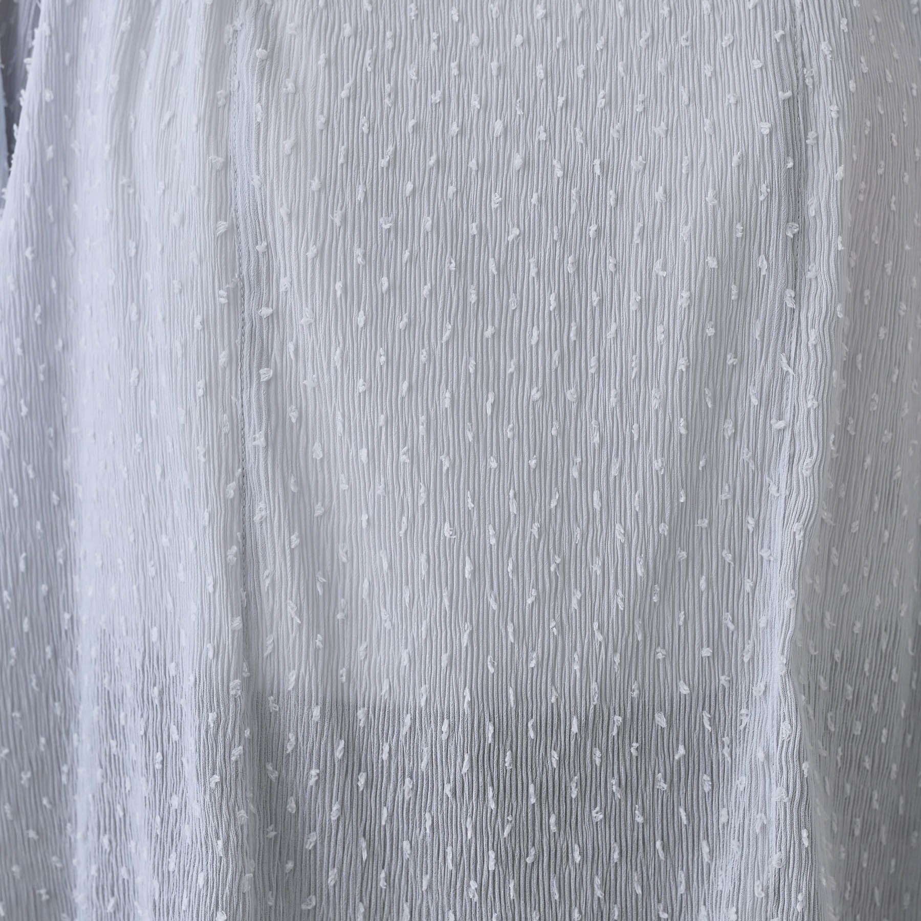 INDIVI「【洗える／ドット柄／凹凸素材】袖コンシャスドルマンブラウス」|シャツ・ブラウス|