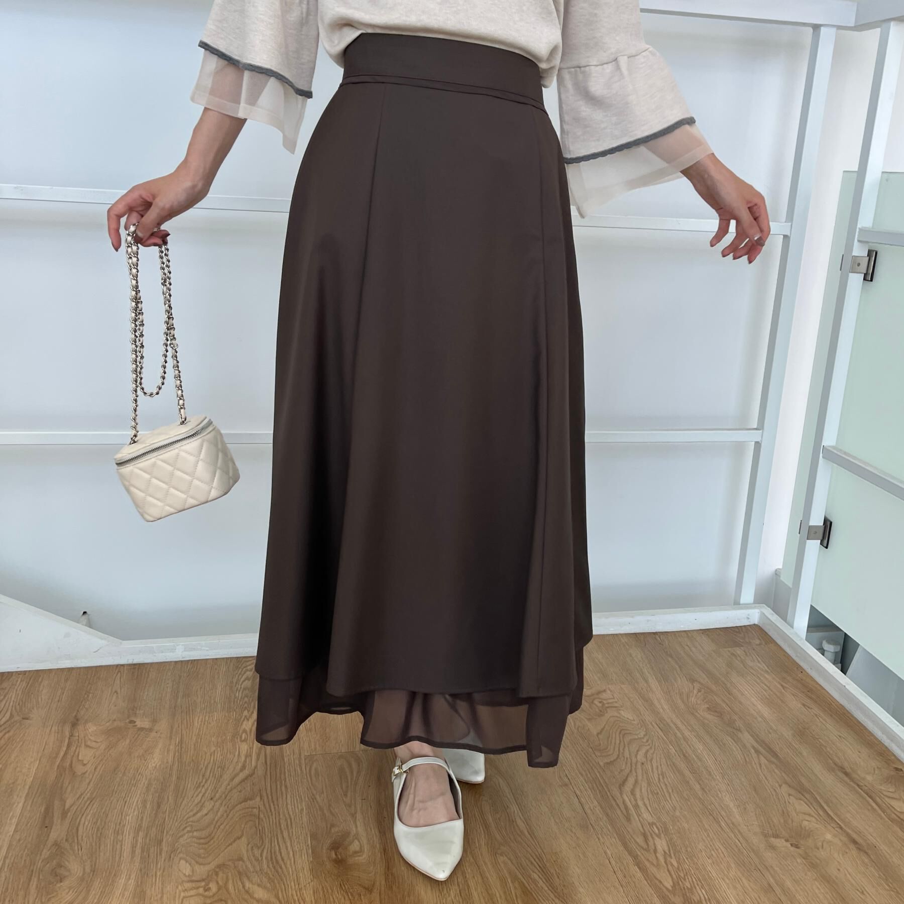 Couture broach「【マシンウォッシャブル・美シルエット】裾シアーフレアスカート」|スカート|