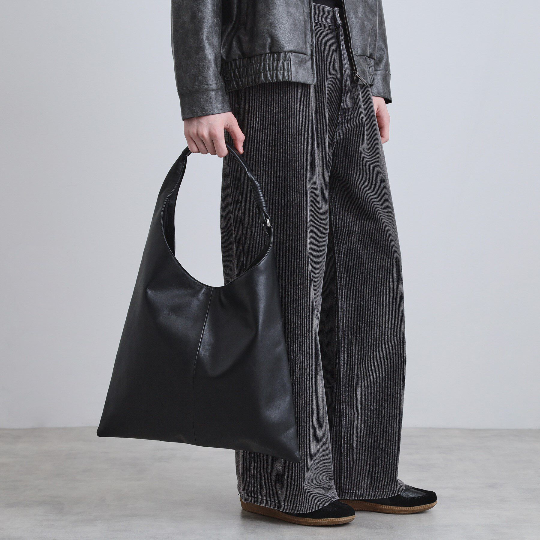 tk.TAKEO KIKUCHI「【牛革使用】リアルレザートラペゾイドバッグ」|トートバッグ|