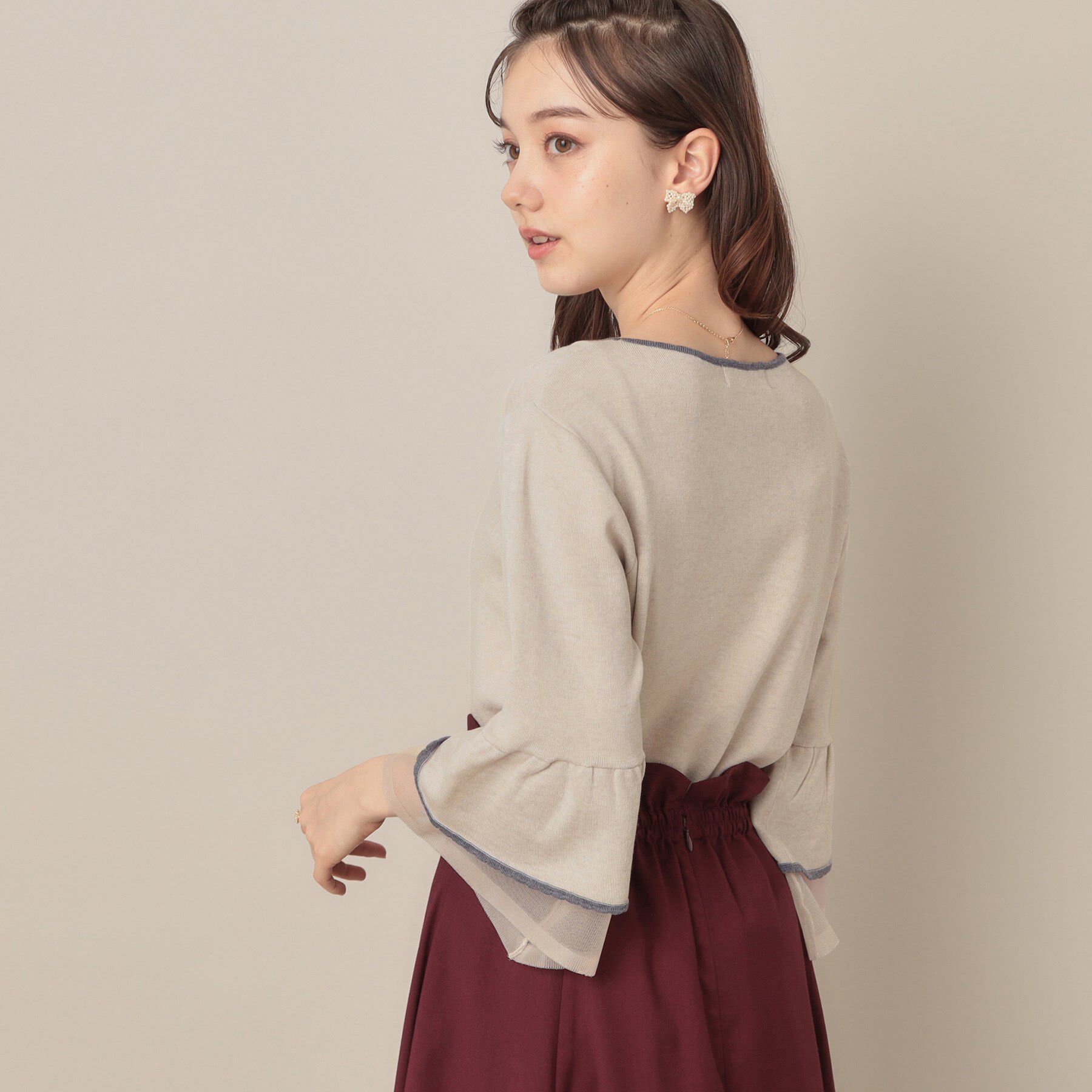 Couture broach「【フェミニン・着映え・通勤】シアーフレアー袖ニットトップス」|ニット・セーター|