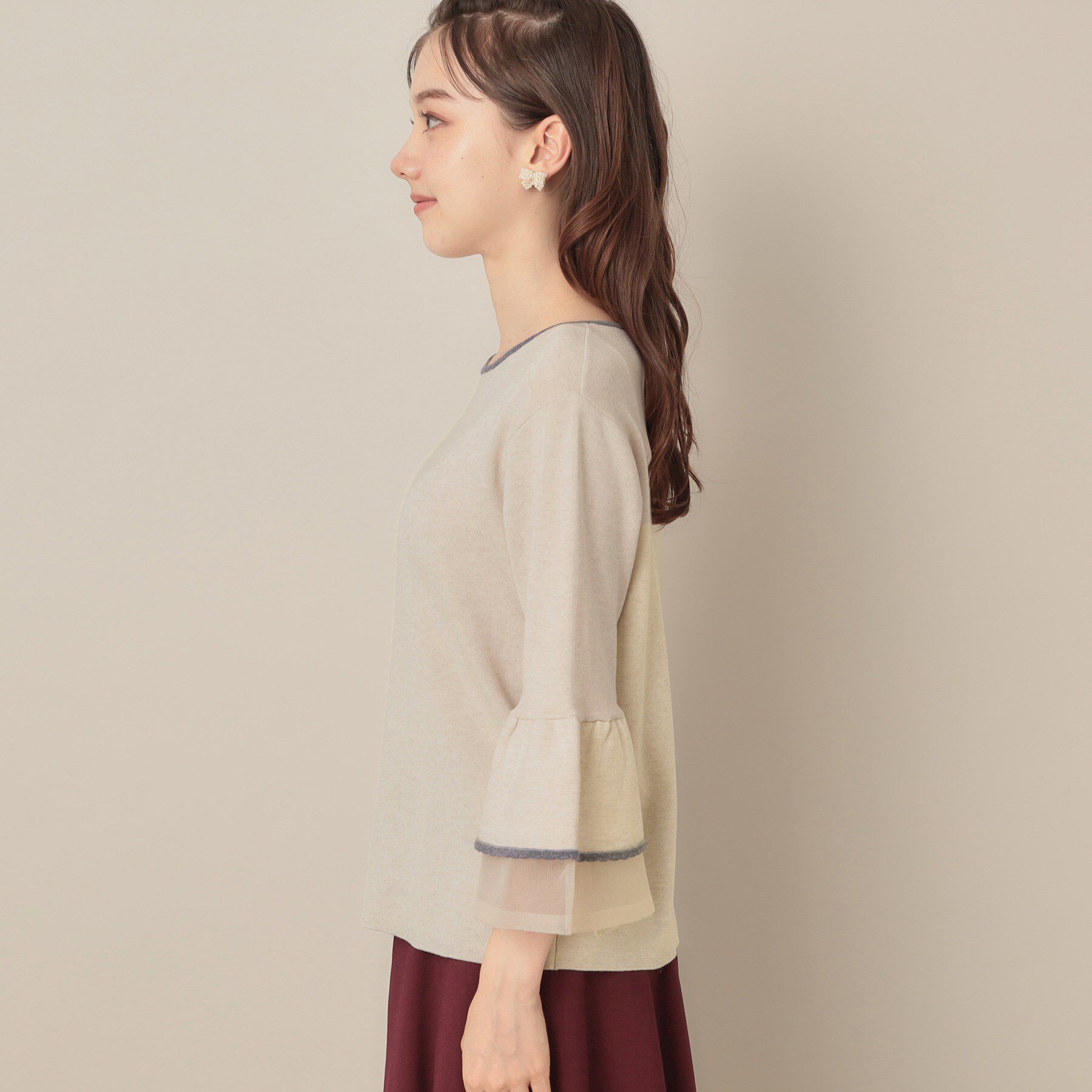Couture broach「【フェミニン・着映え・通勤】シアーフレアー袖ニットトップス」|ニット・セーター|
