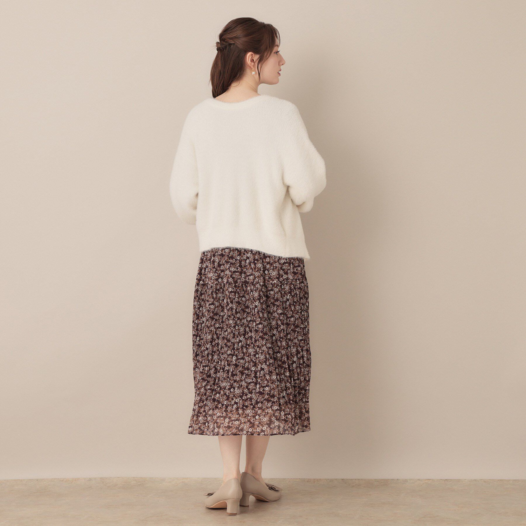 Couture broach「【高見え・大人可愛い】ビジューリボン釦 前後2WAYフェザーカーディガントップス」|カーディガン|