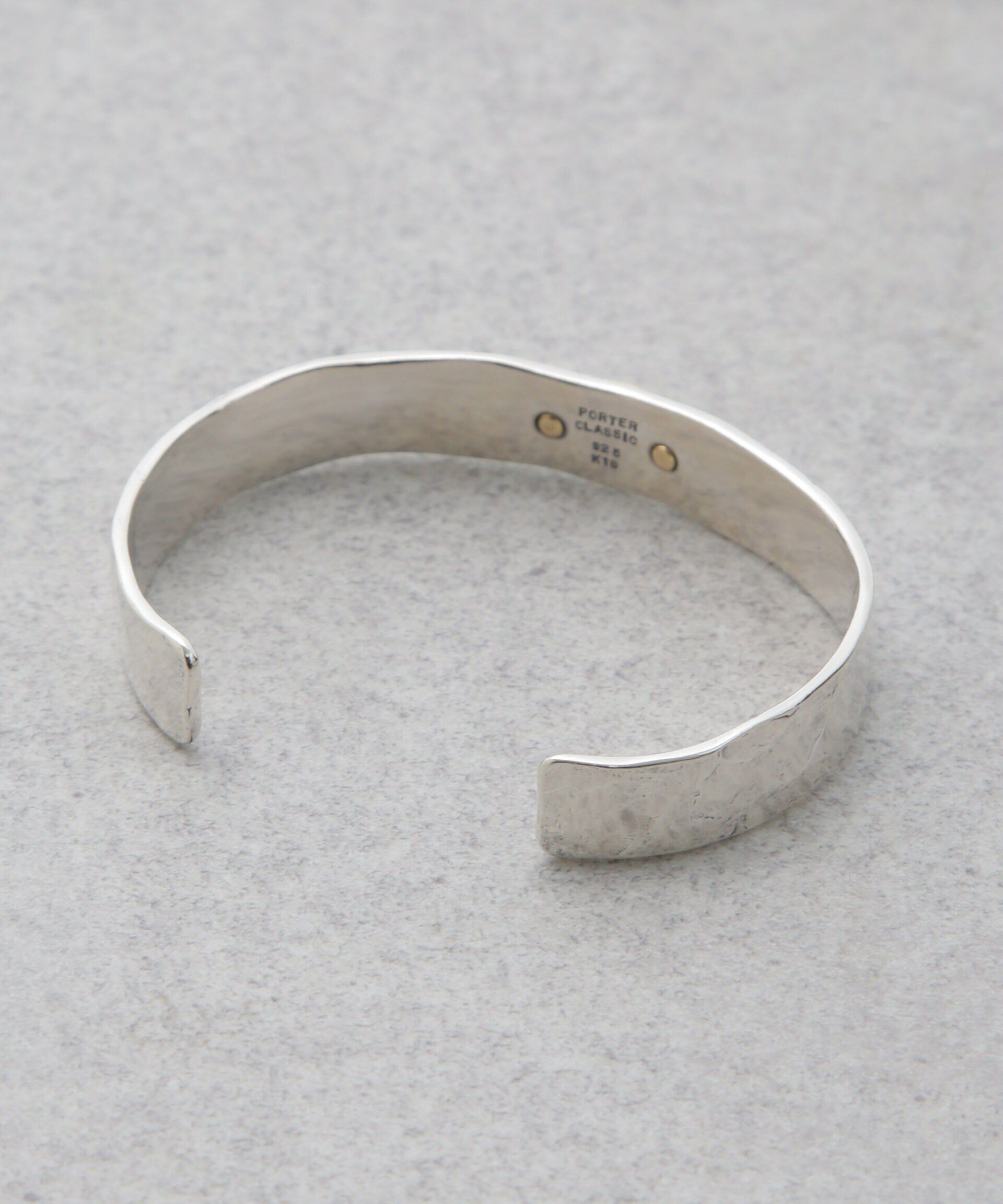 nano･universe「Porter Classic/GOLD RIVET BANGLE LOVE & PEACE」|ブレスレット・バングル|