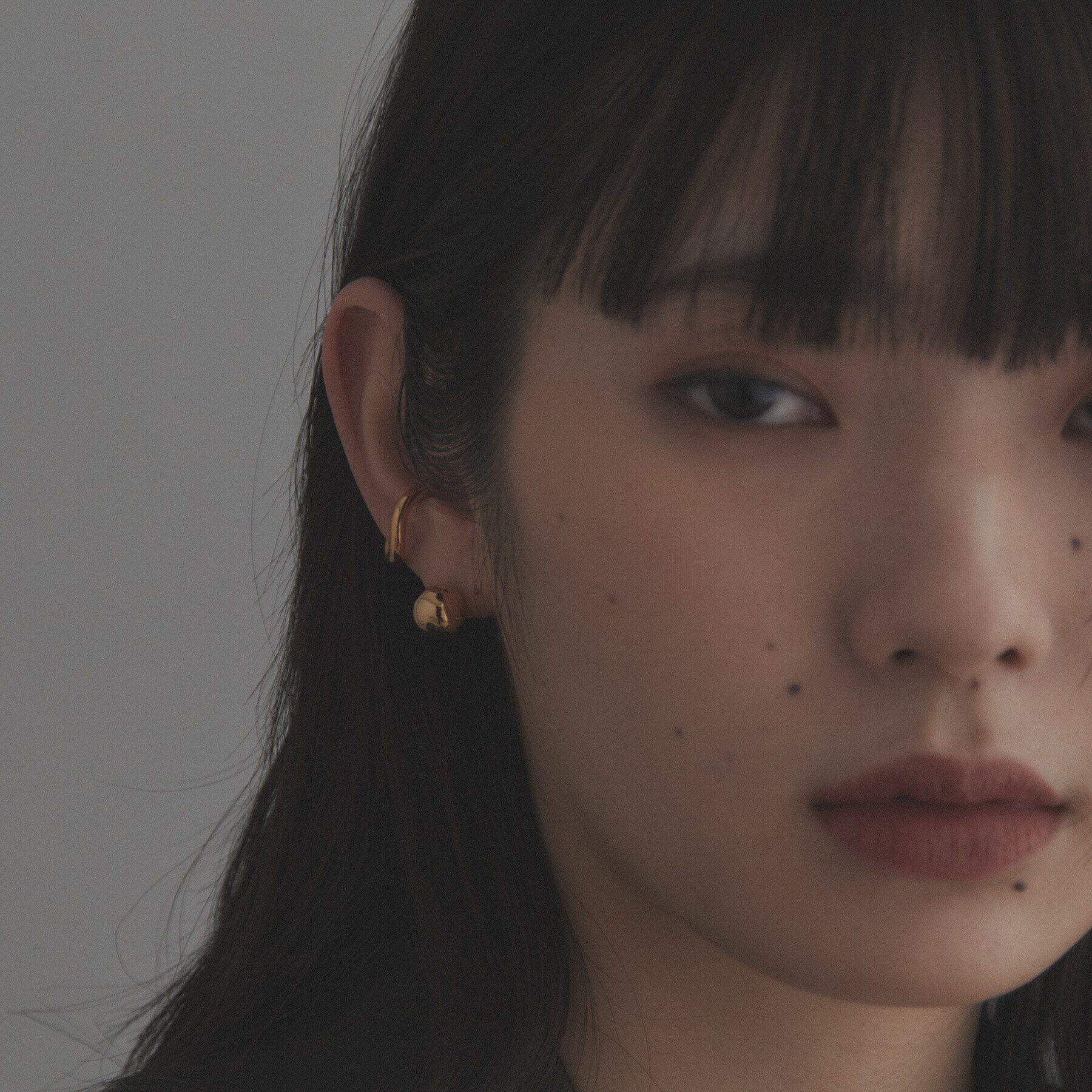 COCOSHNIK ONKITSCH「シルバー ラインイヤーカフ カーブ GP」|イヤリング|