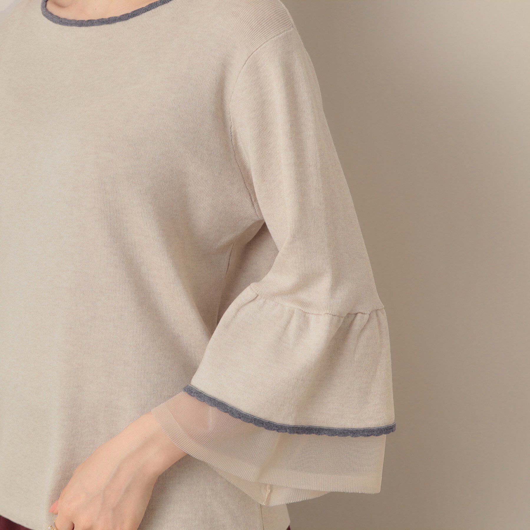 Couture broach「【フェミニン・着映え・通勤】シアーフレアー袖ニットトップス」|ニット・セーター|