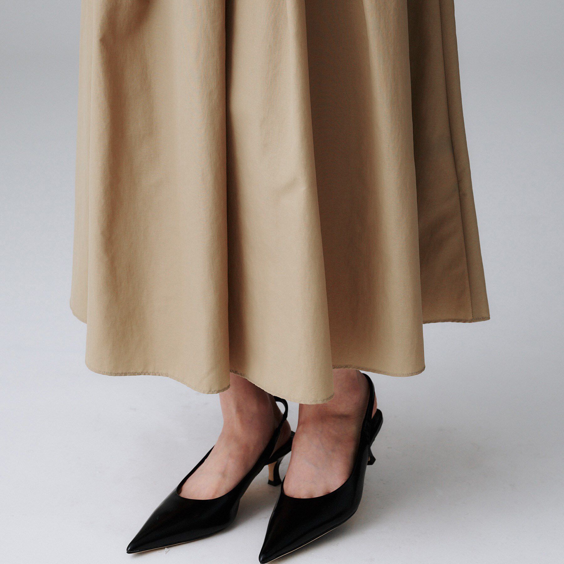 UNTITLED「【はっ水/ナイロン/後ろウエストゴム】タスランフレアスカート」|スカート|