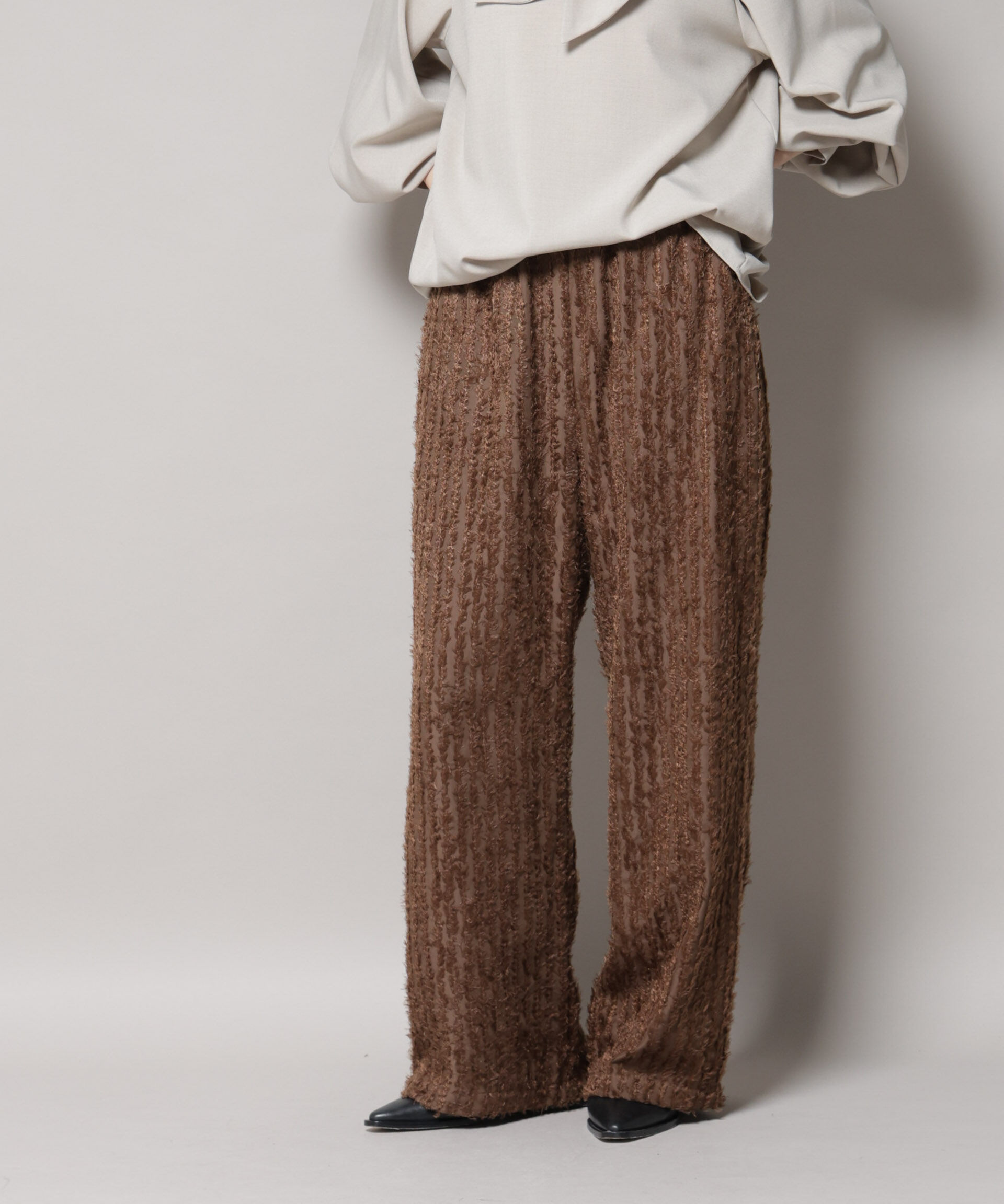 nano･universe「フリンジジャガードパンツ」|チノ|