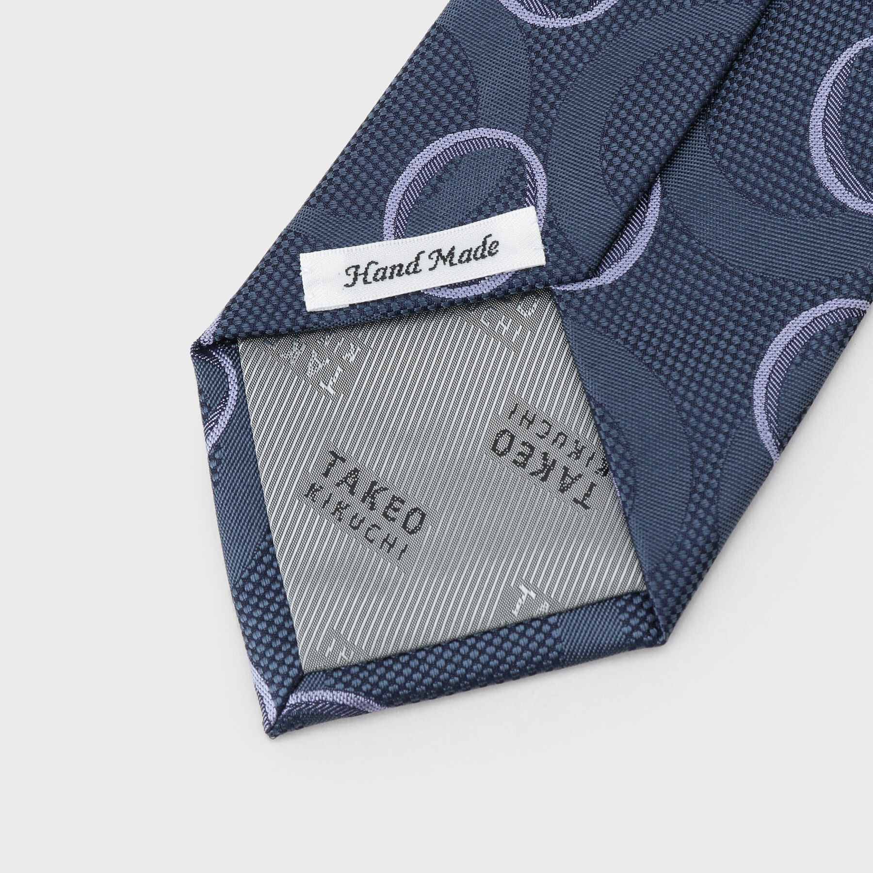 TAKEO KIKUCHI「【縁起の良いネクタイ】PNJ 巴（ともえ）紋ジオメトリックネクタイ」|ネクタイ・蝶ネクタイ|