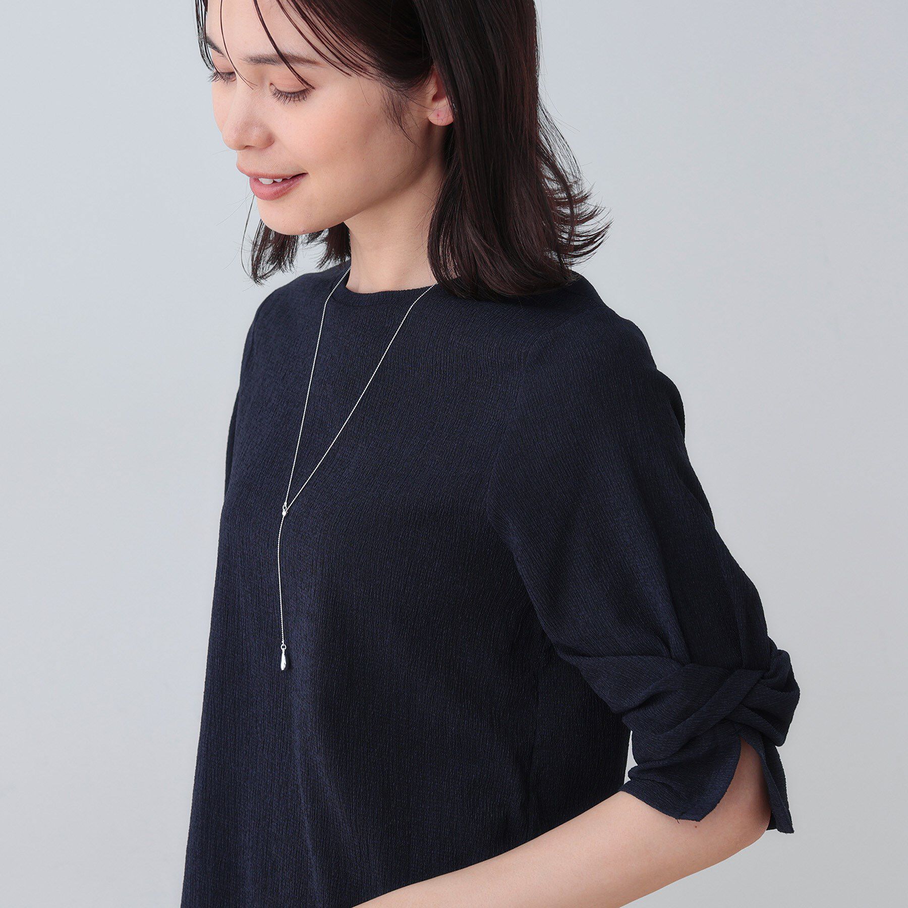 INDIVI「【洗える／吸水速乾／UVケア】ねじりデザイン袖カットソー」|Tシャツ・カットソー|ネイビー(094)