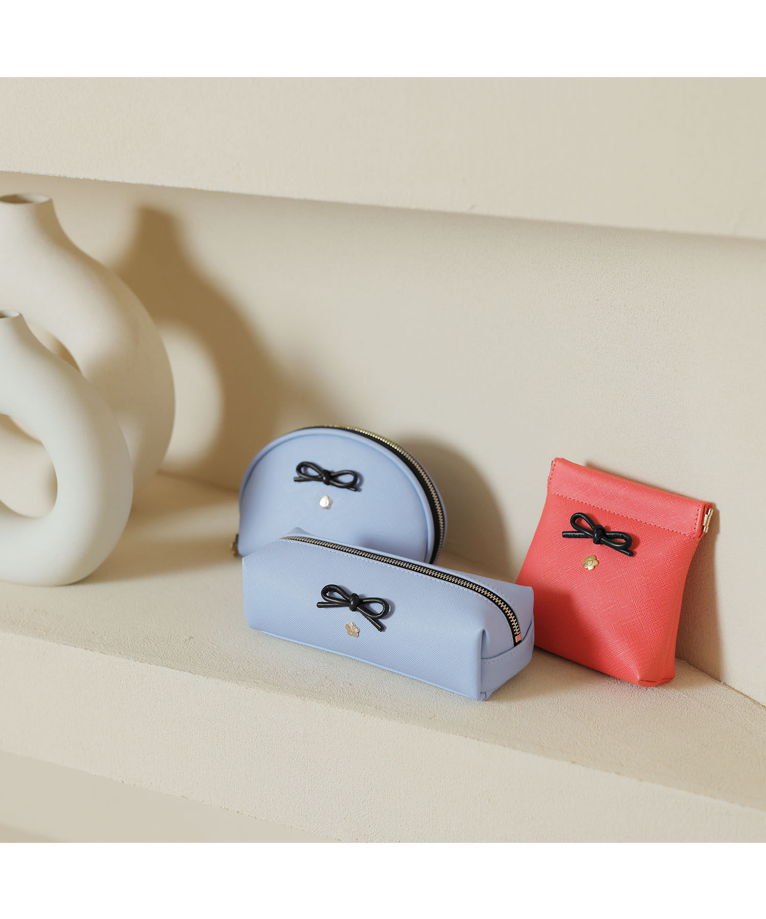 MARY QUANT「サフィアーノリボン バネクチポーチ」|ポーチ|