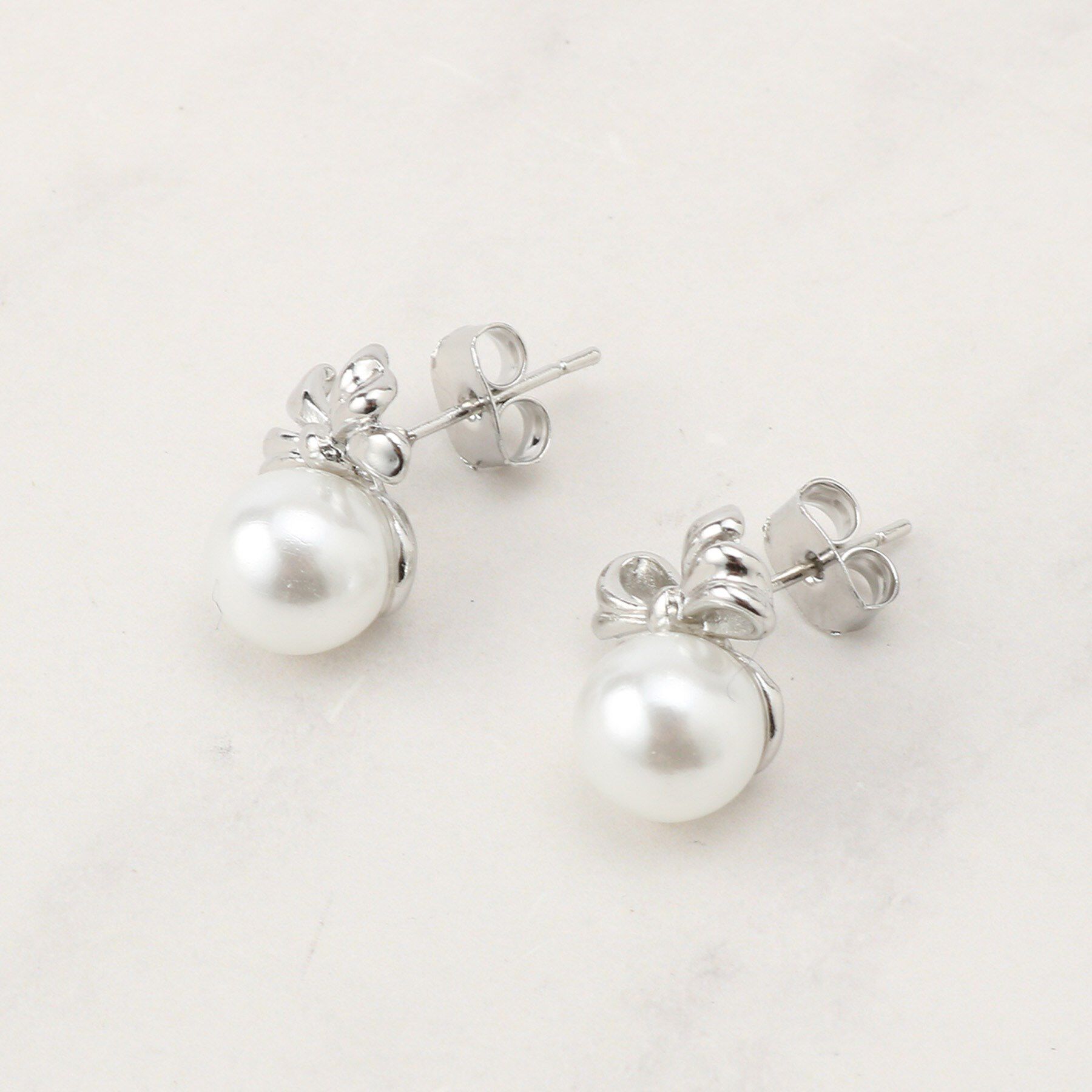 Couture broach「リボンパール調ピアス」|ピアス|