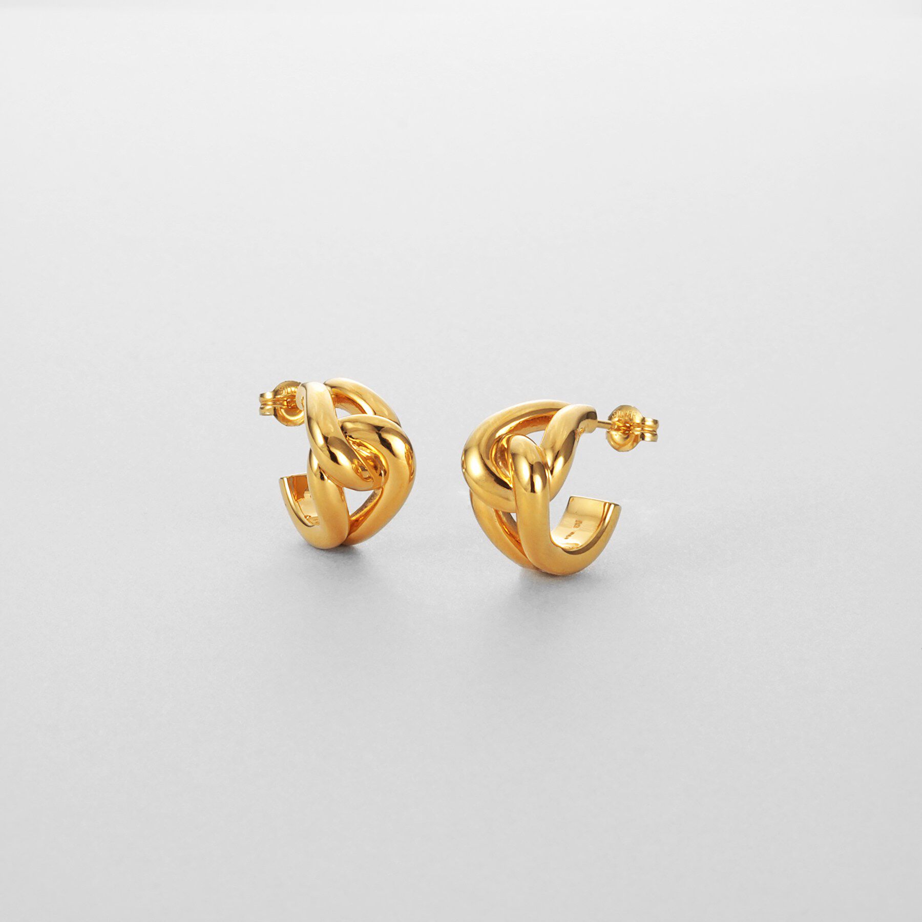 COCOSHNIK ONKITSCH「シルバー スモールフープ ノットピアス GP」|ピアス|