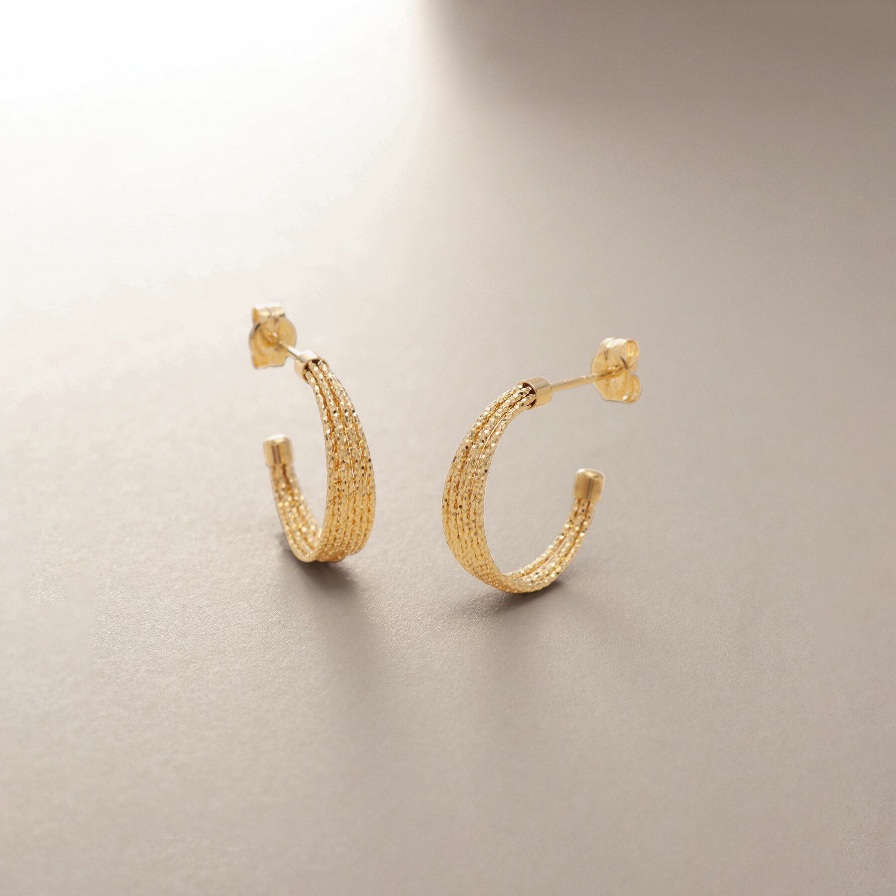 COCOSHNIK「K18ミラーカット7連 フープピアス」|ピアス|