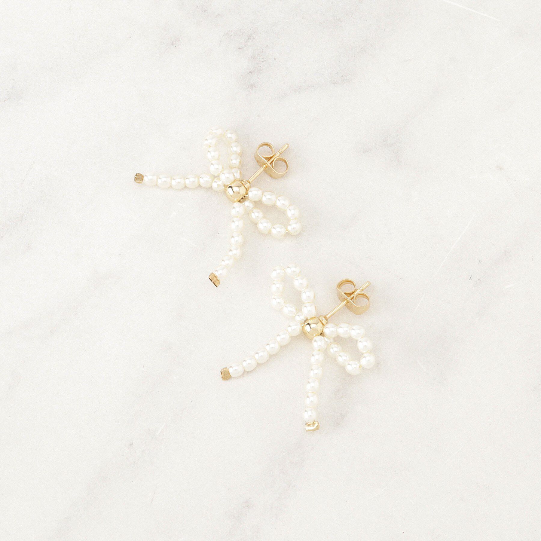 Couture broach「パール調リボンデザインピアス」|ピアス|