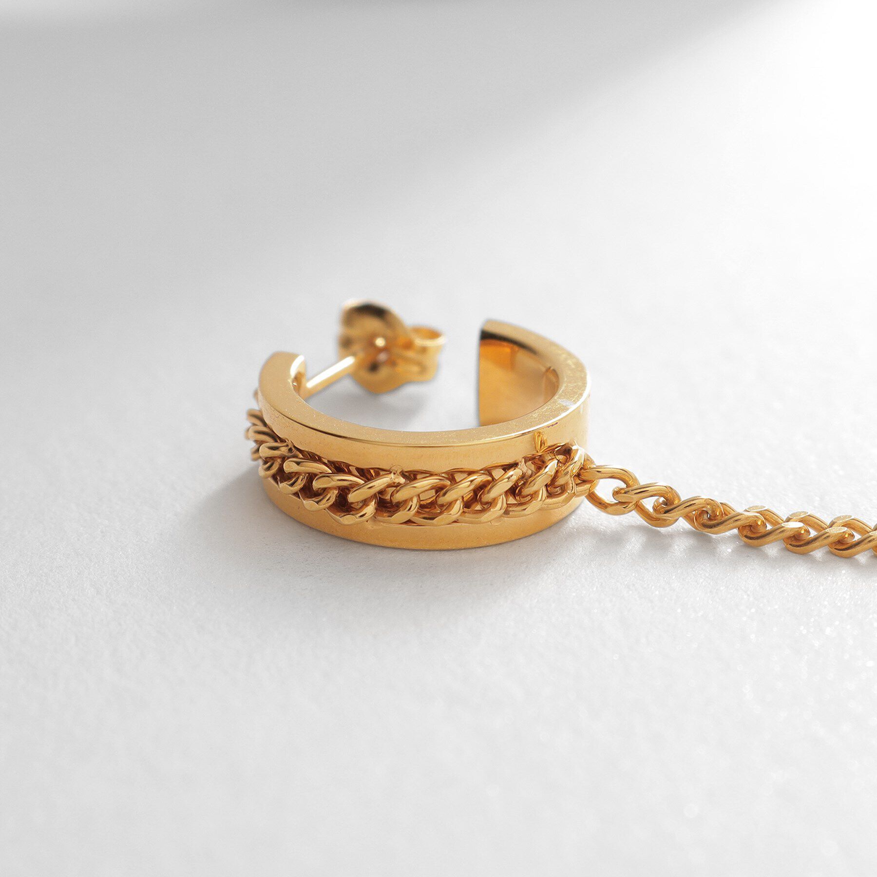 COCOSHNIK ONKITSCH「シルバー ハンギング カーブチェーンピアス GP」|ピアス|