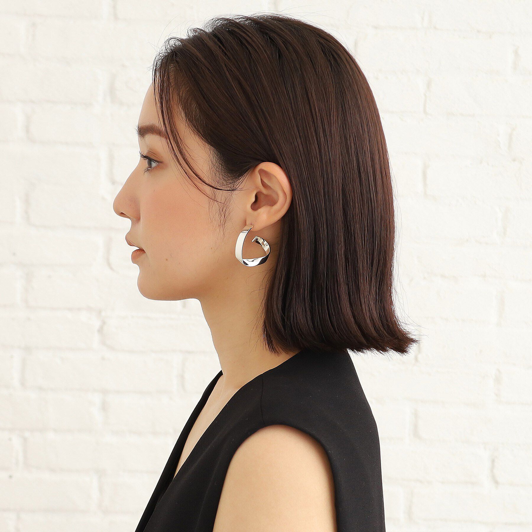 COCOSHNIK ONKITSCH「シルバー フォールディングピアス ストリーム」|ピアス|