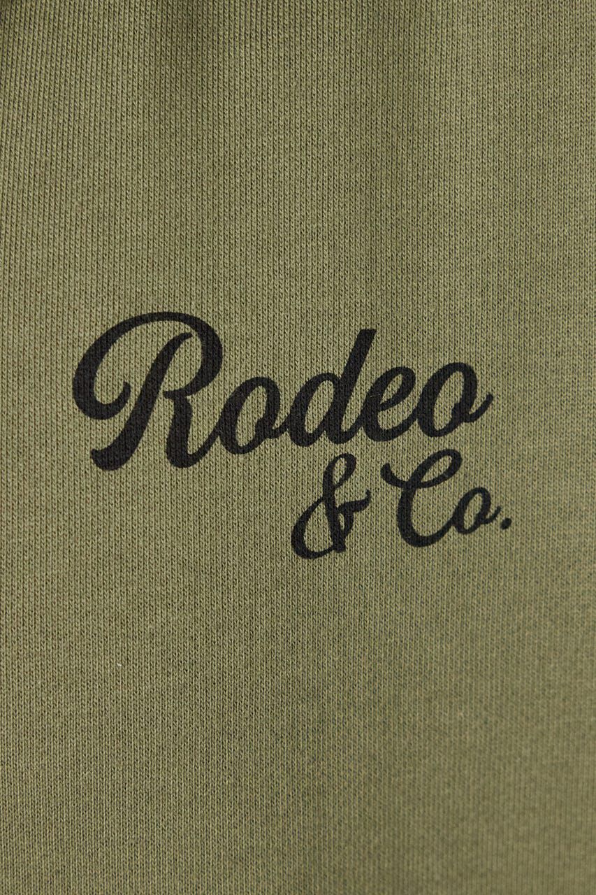 RODEO CROWNS「ドッキングスクリプトロゴZIPパーカー」|パーカー|